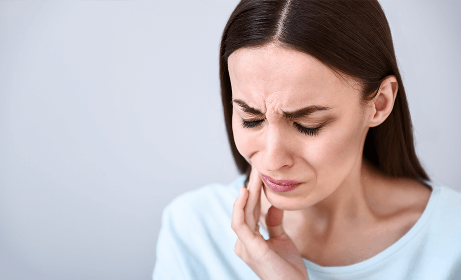 woman with mouth pain